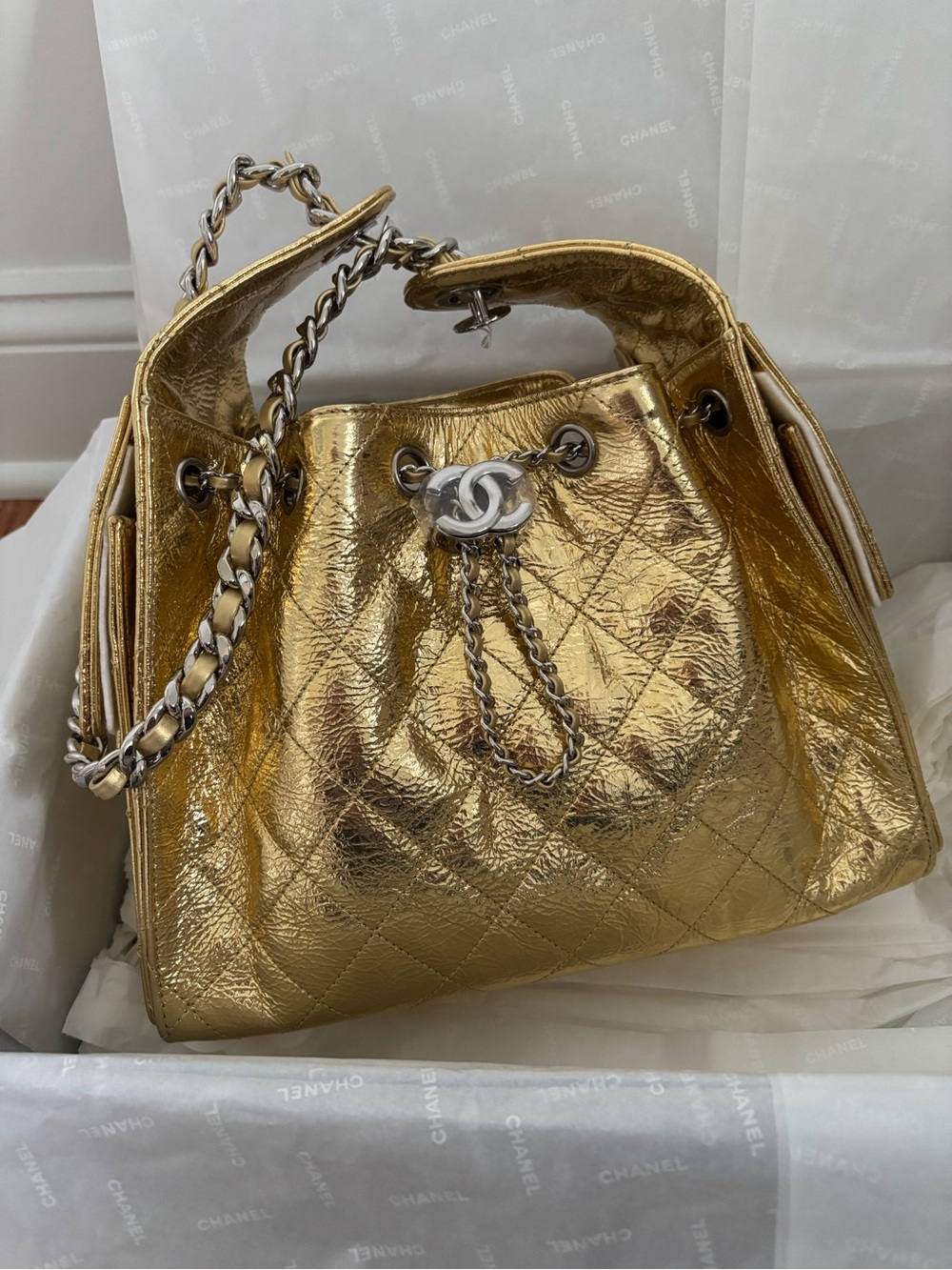 CHANEL Metallic 25 small gold with silver hardware .